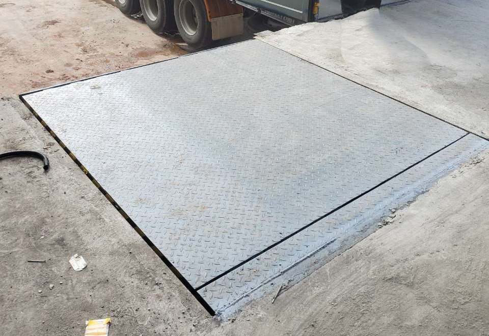Minghua dock leveler: a solid bridge for efficient logistics loading and unloading
